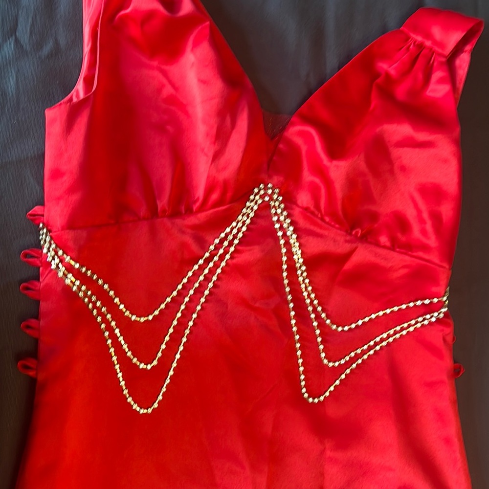 Red prom dress with size adjustable corset tabs